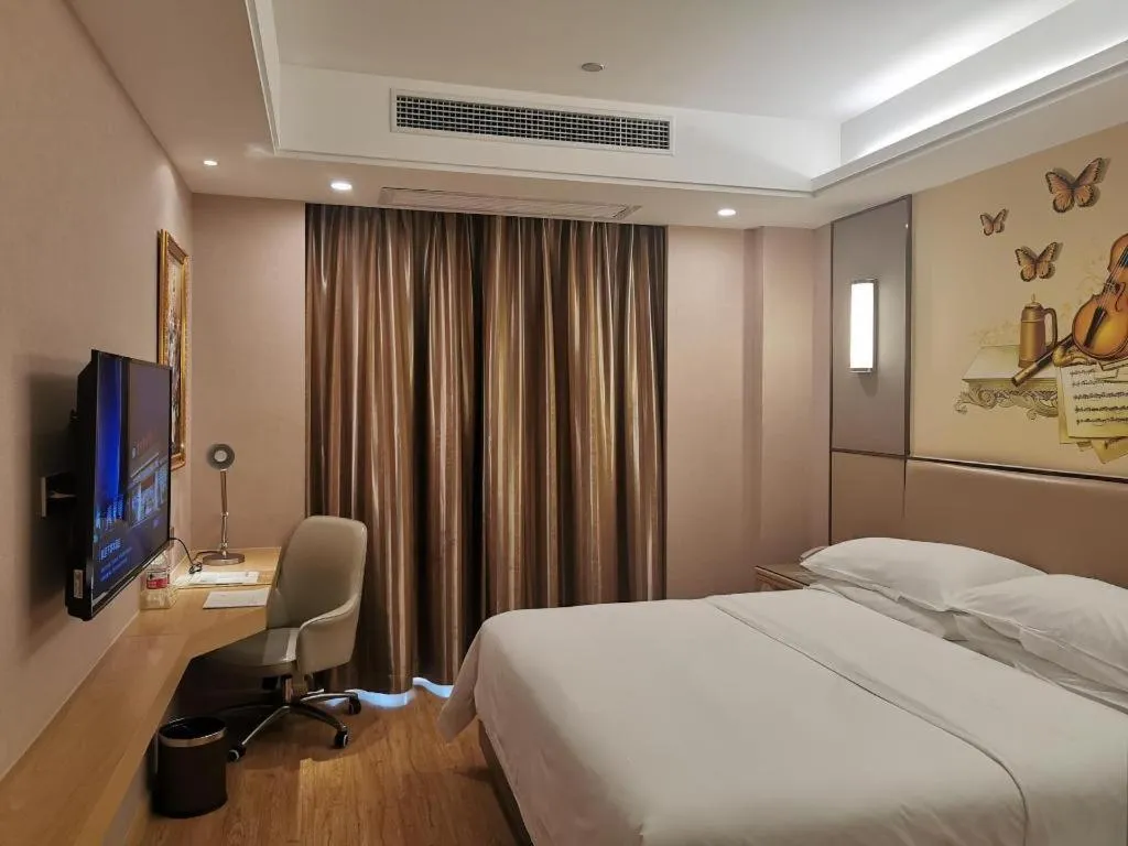 Bed in Vienna Hotel Nanning Xiangsi Lake University Town