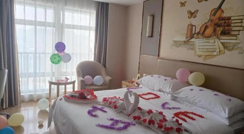 Bed in Vienna Hotel Nanning Xiangsi Lake University Town