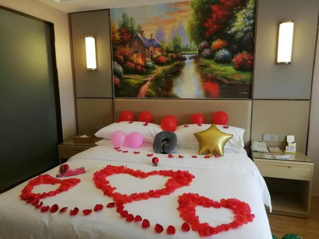 Bed in Vienna Hotel Nanning Xiangsi Lake University Town