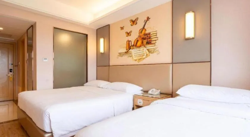 Bed in Vienna Hotel Nanning Xiangsi Lake University Town