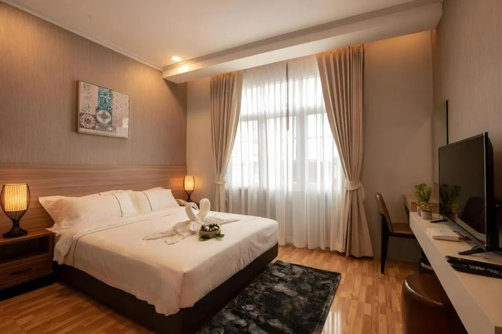 Bed in One Vientiane Hotel