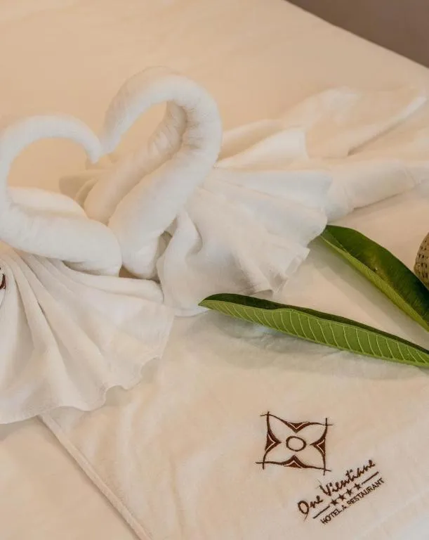 Bed in One Vientiane Hotel