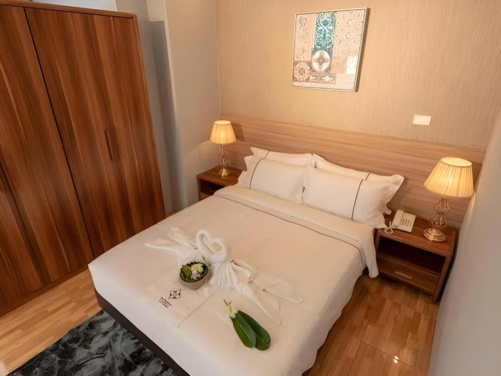 Bed in One Vientiane Hotel