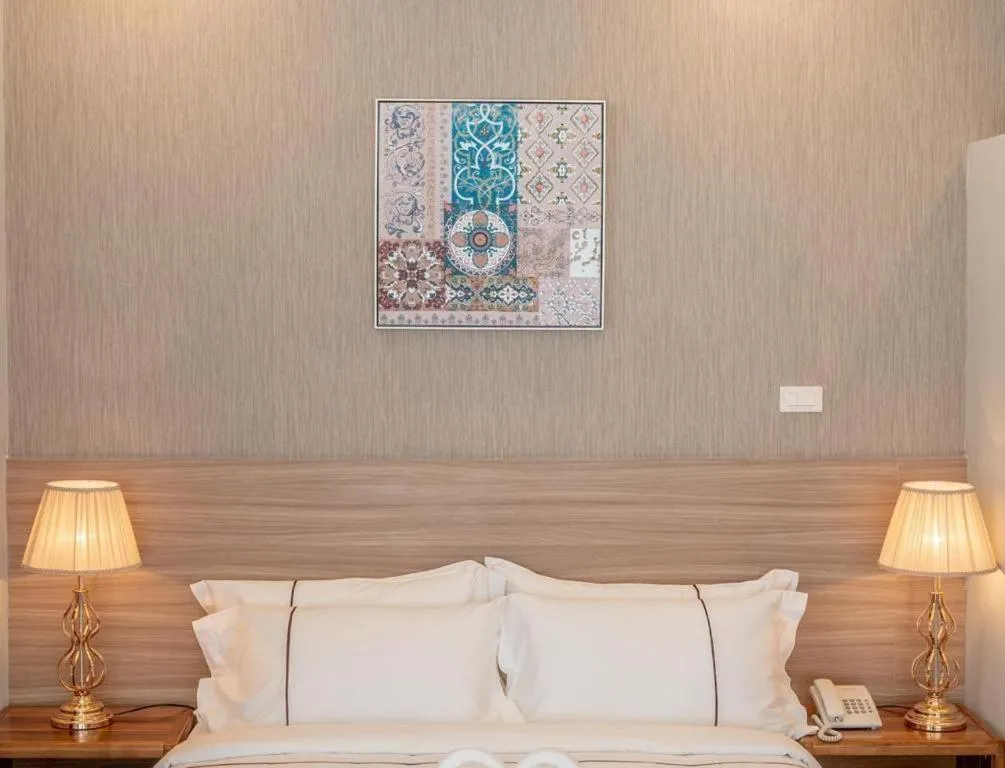 Bed in One Vientiane Hotel