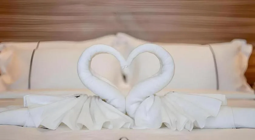 Bed in One Vientiane Hotel