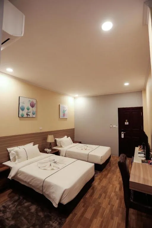 Bed in One Vientiane Hotel