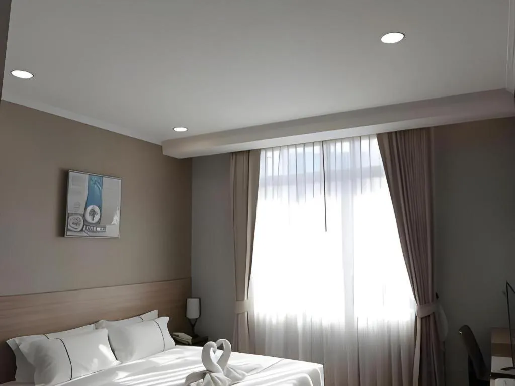 Bed in One Vientiane Hotel