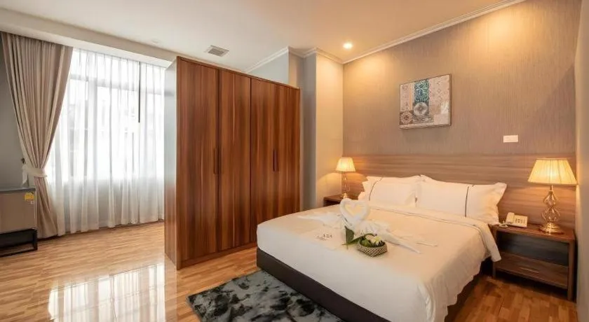 Bed in One Vientiane Hotel