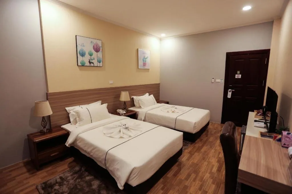 Bed in One Vientiane Hotel