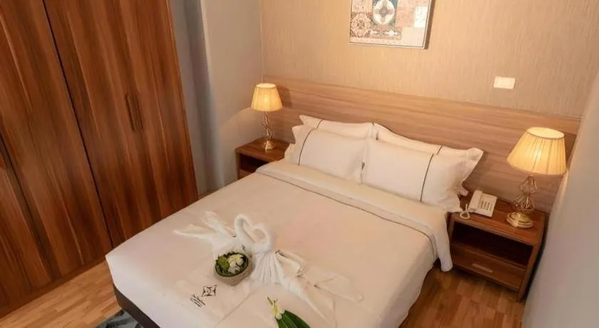 Bed in One Vientiane Hotel