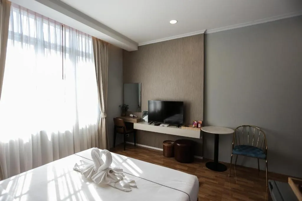 Bed in One Vientiane Hotel