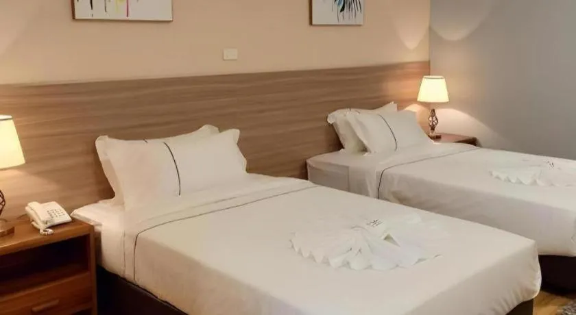 Bed in One Vientiane Hotel