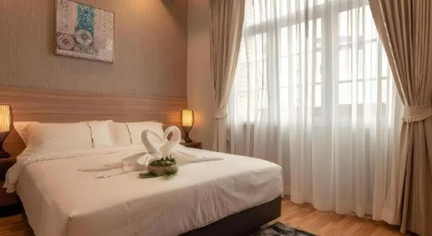 Bed in One Vientiane Hotel