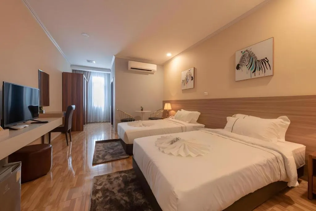 Bed in One Vientiane Hotel