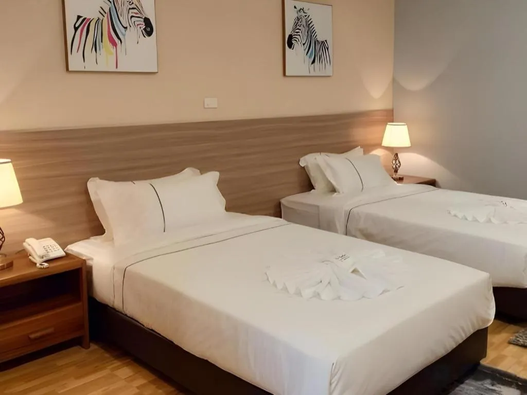 Bed in One Vientiane Hotel