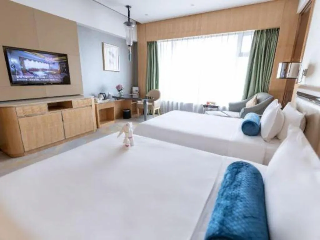 Bed in Shanghai Fuyue Hotel