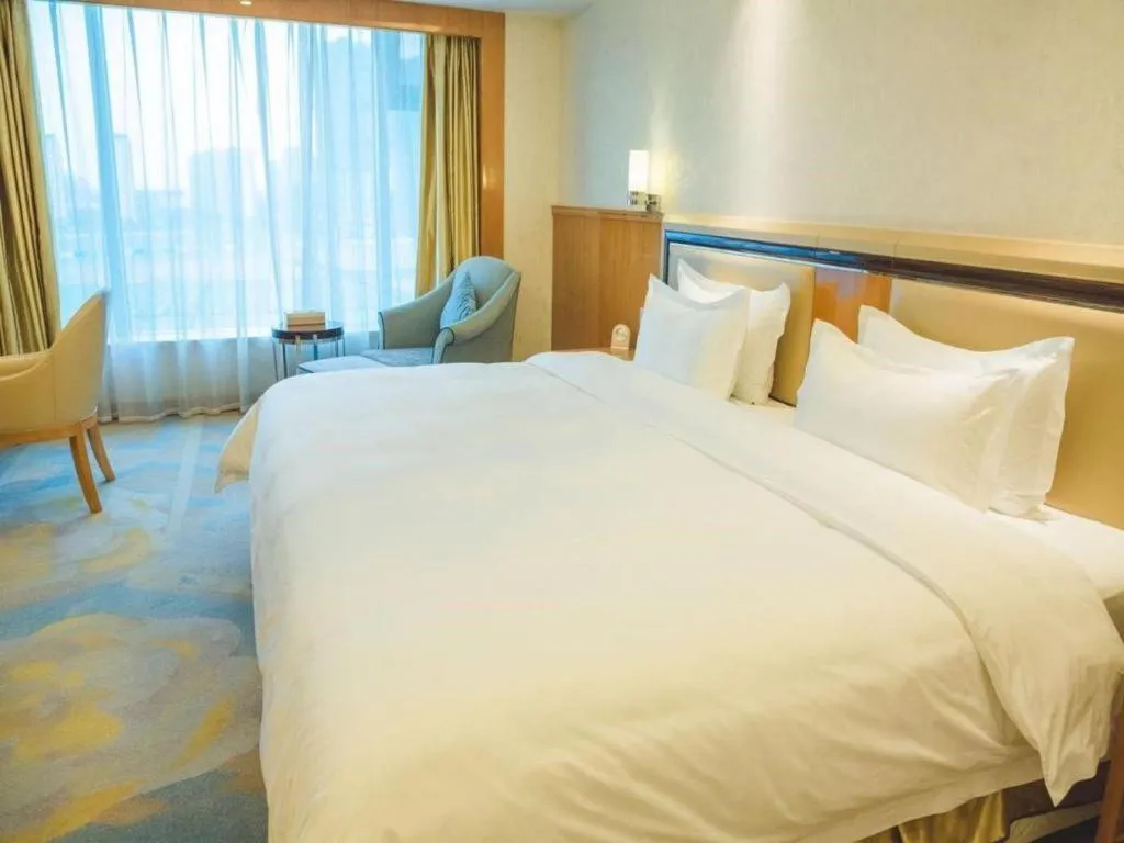 Bed in Shanghai Fuyue Hotel