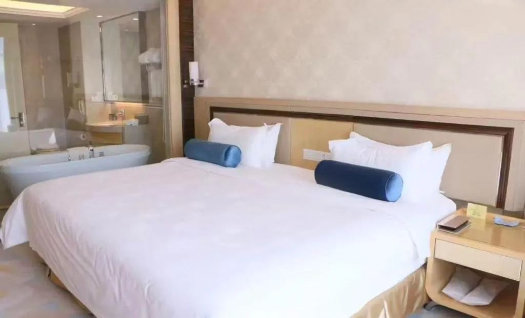 Bed in Shanghai Fuyue Hotel