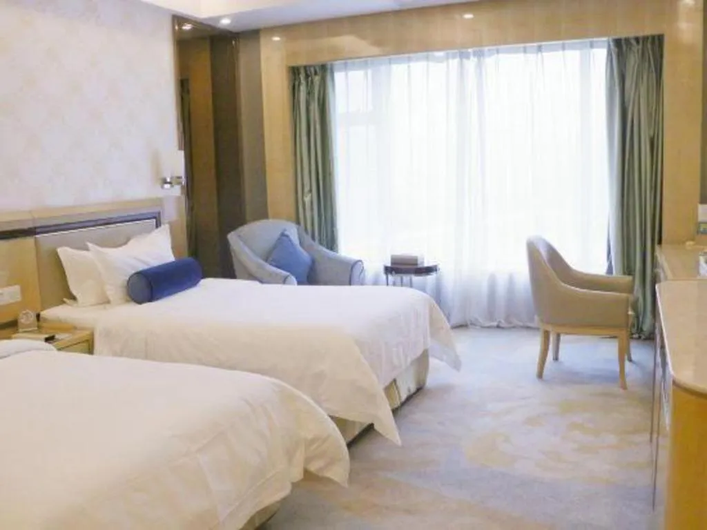 Bed in Shanghai Fuyue Hotel