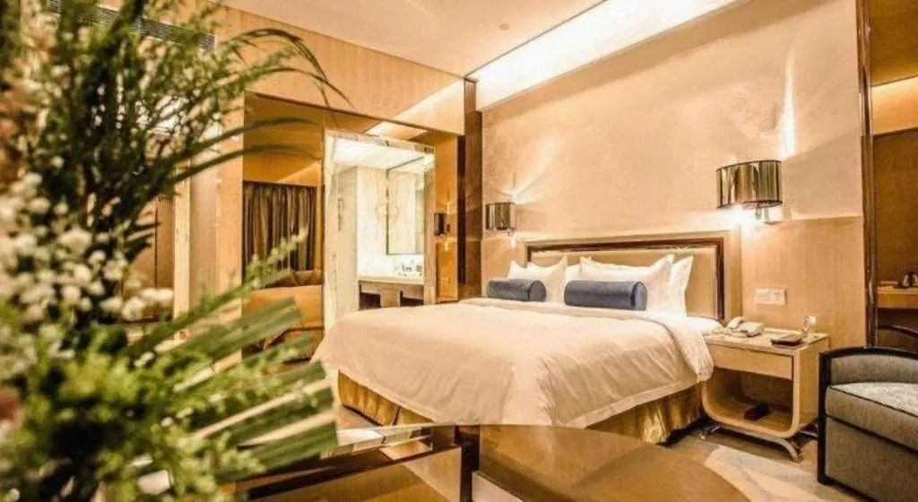 Bed in Shanghai Fuyue Hotel