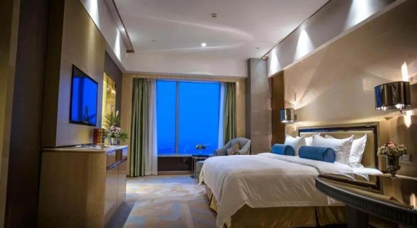 Bed in Shanghai Fuyue Hotel