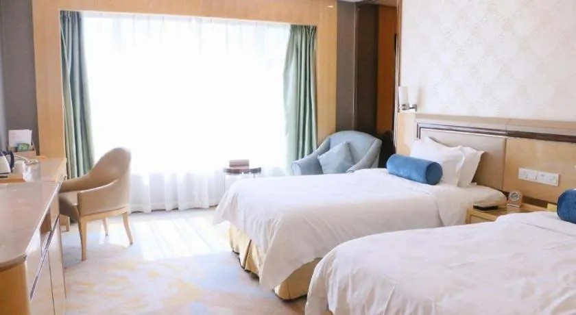 Bed in Shanghai Fuyue Hotel