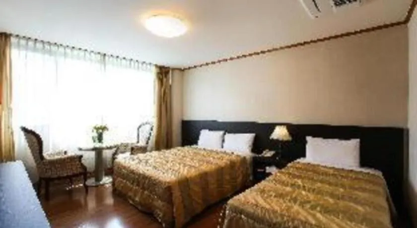 Bed in Danyang tourist hotel Edelweiss