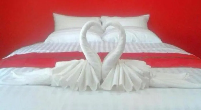 Bed in Sawasdee River Kwai Lodge