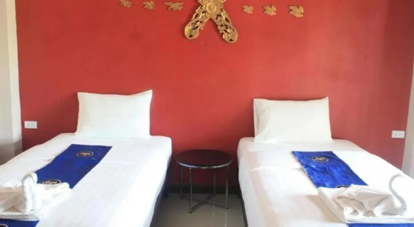 Bed in Sawasdee River Kwai Lodge