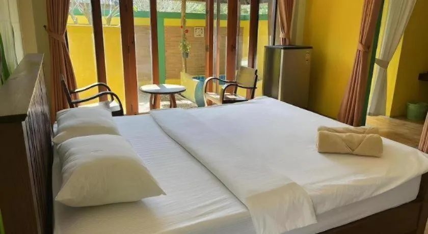 Bed in Aroma Pai Spa Hotel