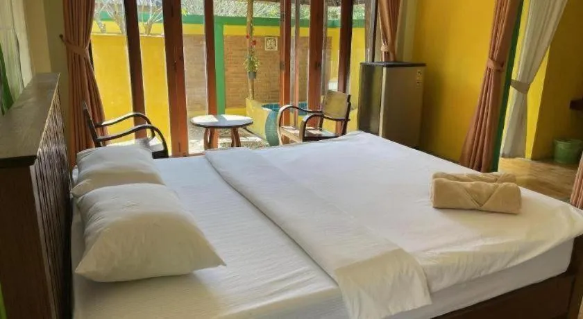 Bed in Aroma Pai Spa Hotel