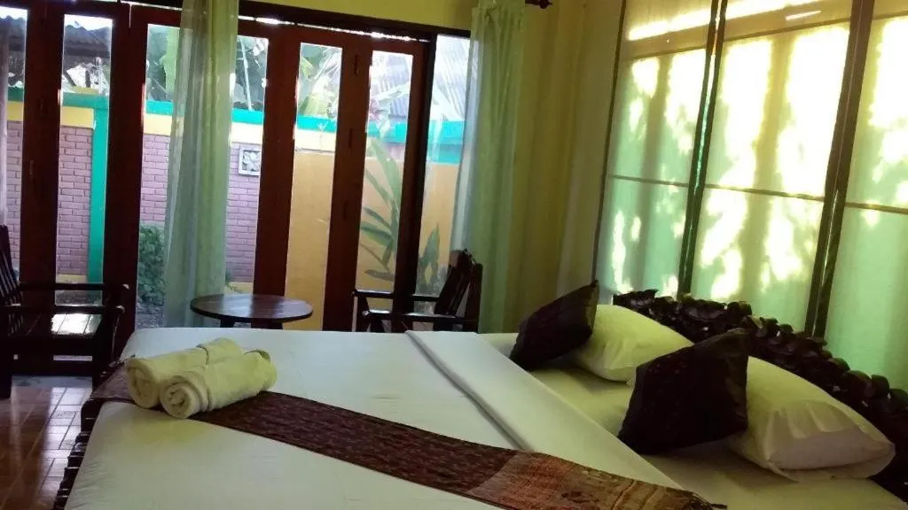 Bed in Aroma Pai Spa Hotel