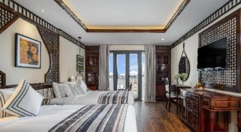 Bed in Le Pavillon Hoi An Paradise Hotel & Spa