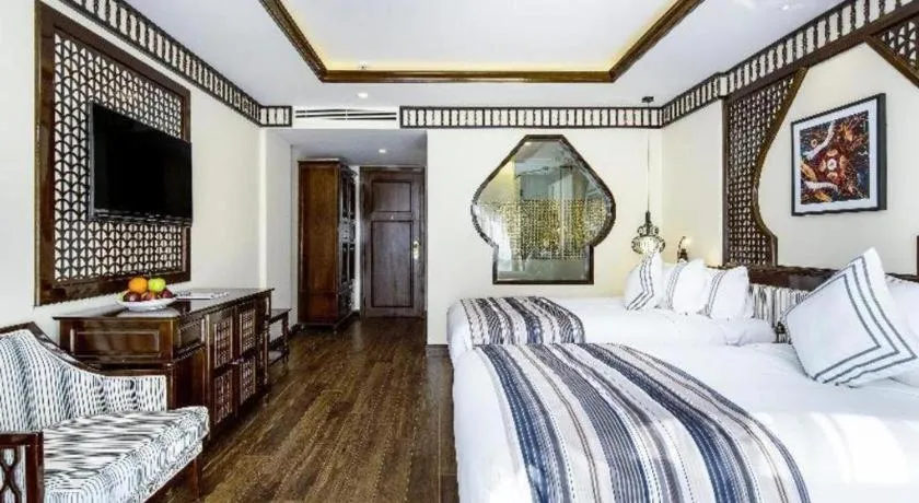 Bed in Le Pavillon Hoi An Paradise Hotel & Spa