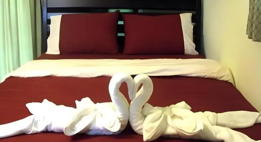 Bed in Green Cottage Beach Resort Bed in Green Cottage Beach Resort