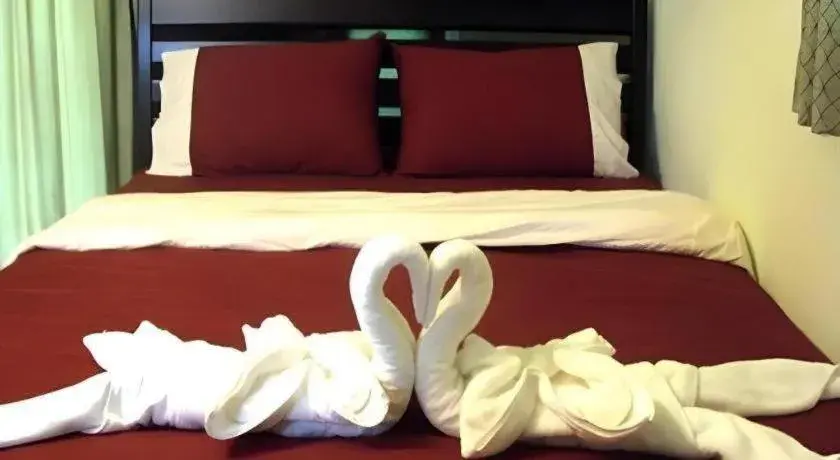 Bed in Green Cottage Beach Resort Bed in Green Cottage Beach Resort