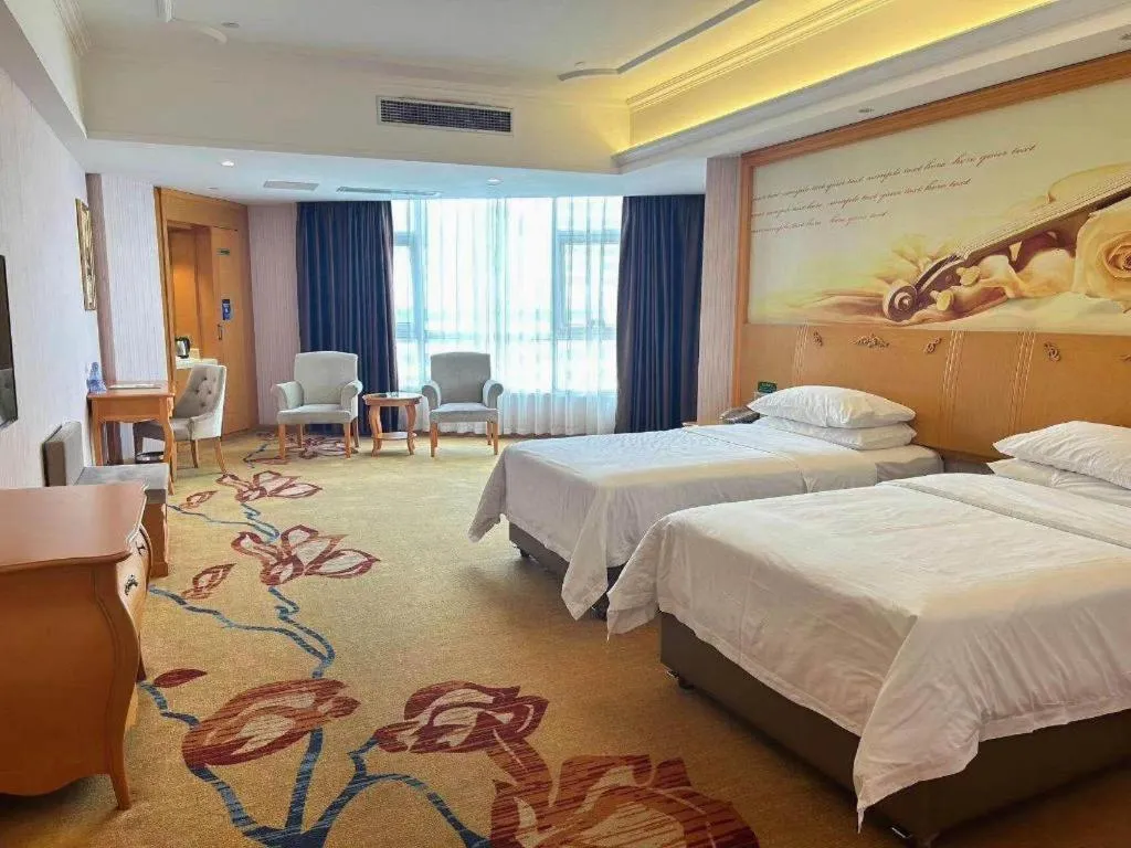 Bed in Vienna Hotel Guangdong Xinyi Jiaoyucheng River View