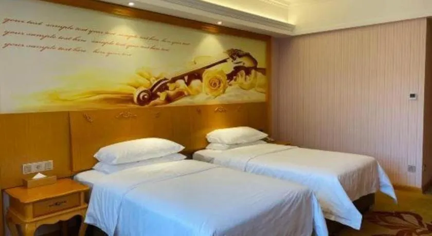Bed in Vienna Hotel Guangdong Xinyi Jiaoyucheng River View