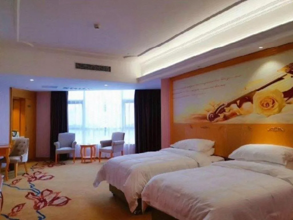 Bed in Vienna Hotel Guangdong Xinyi Jiaoyucheng River View