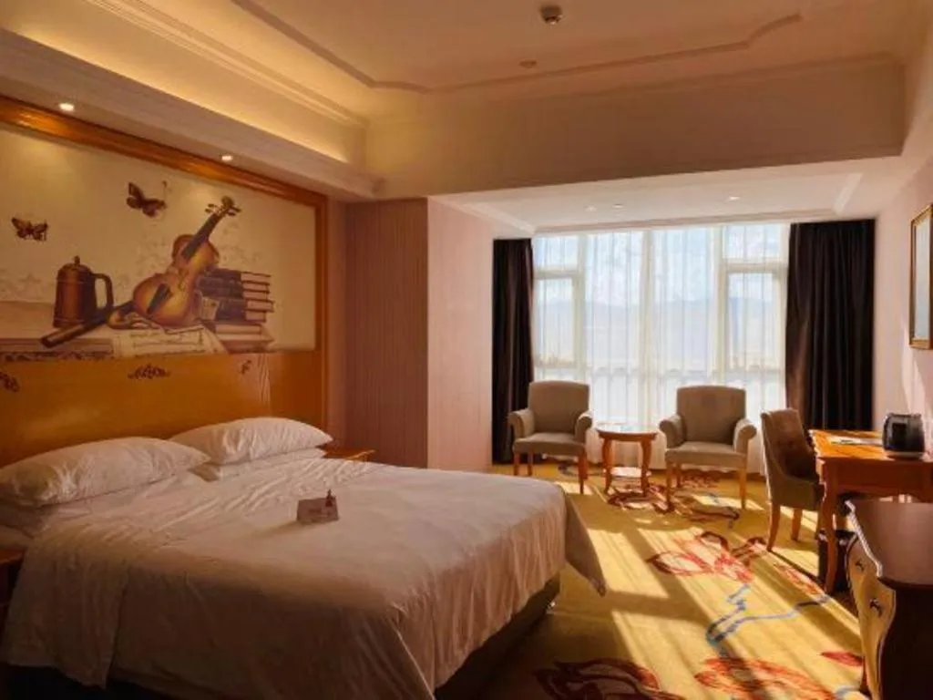 Bed in Vienna Hotel Guangdong Xinyi Jiaoyucheng River View