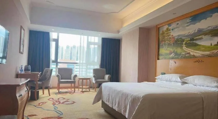 Bed in Vienna Hotel Guangdong Xinyi Jiaoyucheng River View