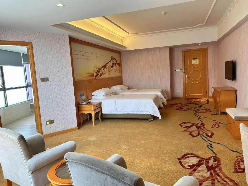 Bed in Vienna Hotel Guangdong Xinyi Jiaoyucheng River View