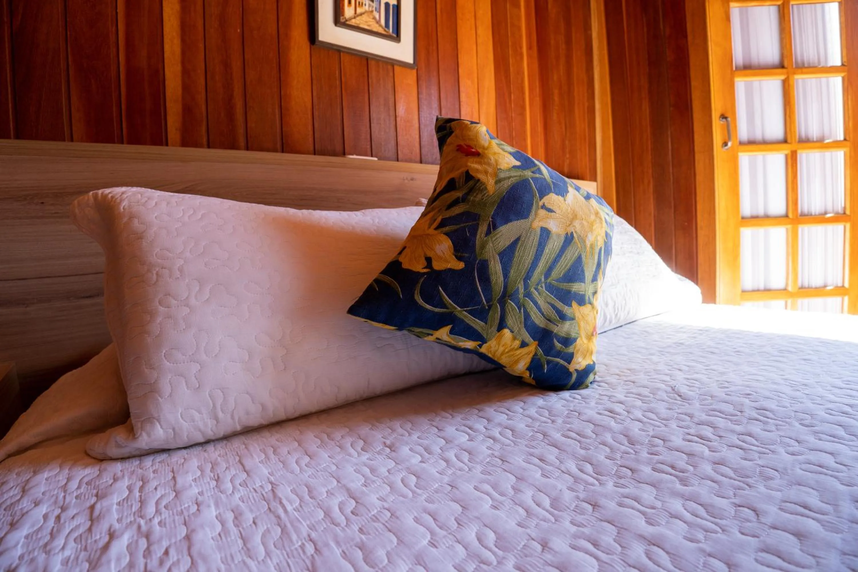 Bed in Pousada Recanto Ninho Verde Chalés