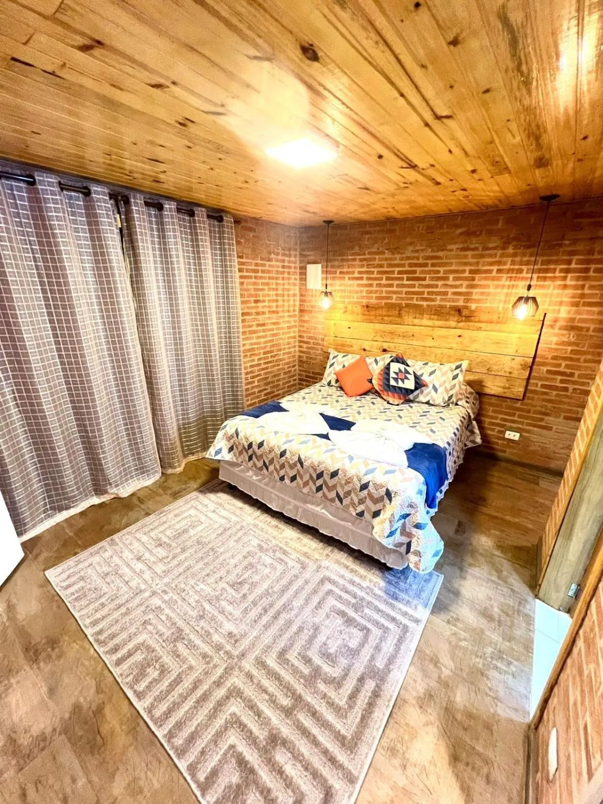 Bed in Pousada Recanto Ninho Verde Chalés