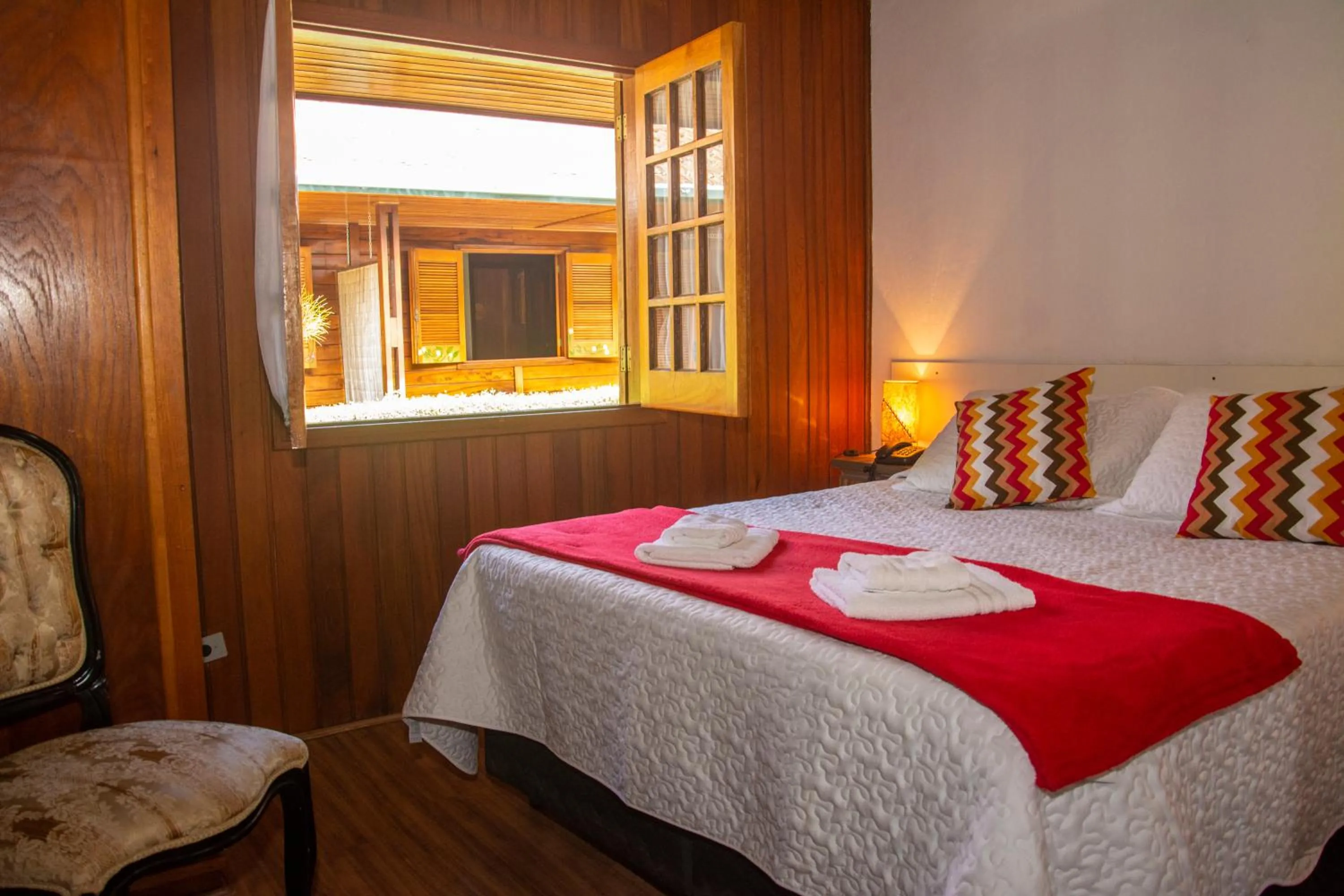 Bed in Pousada Recanto Ninho Verde Chalés