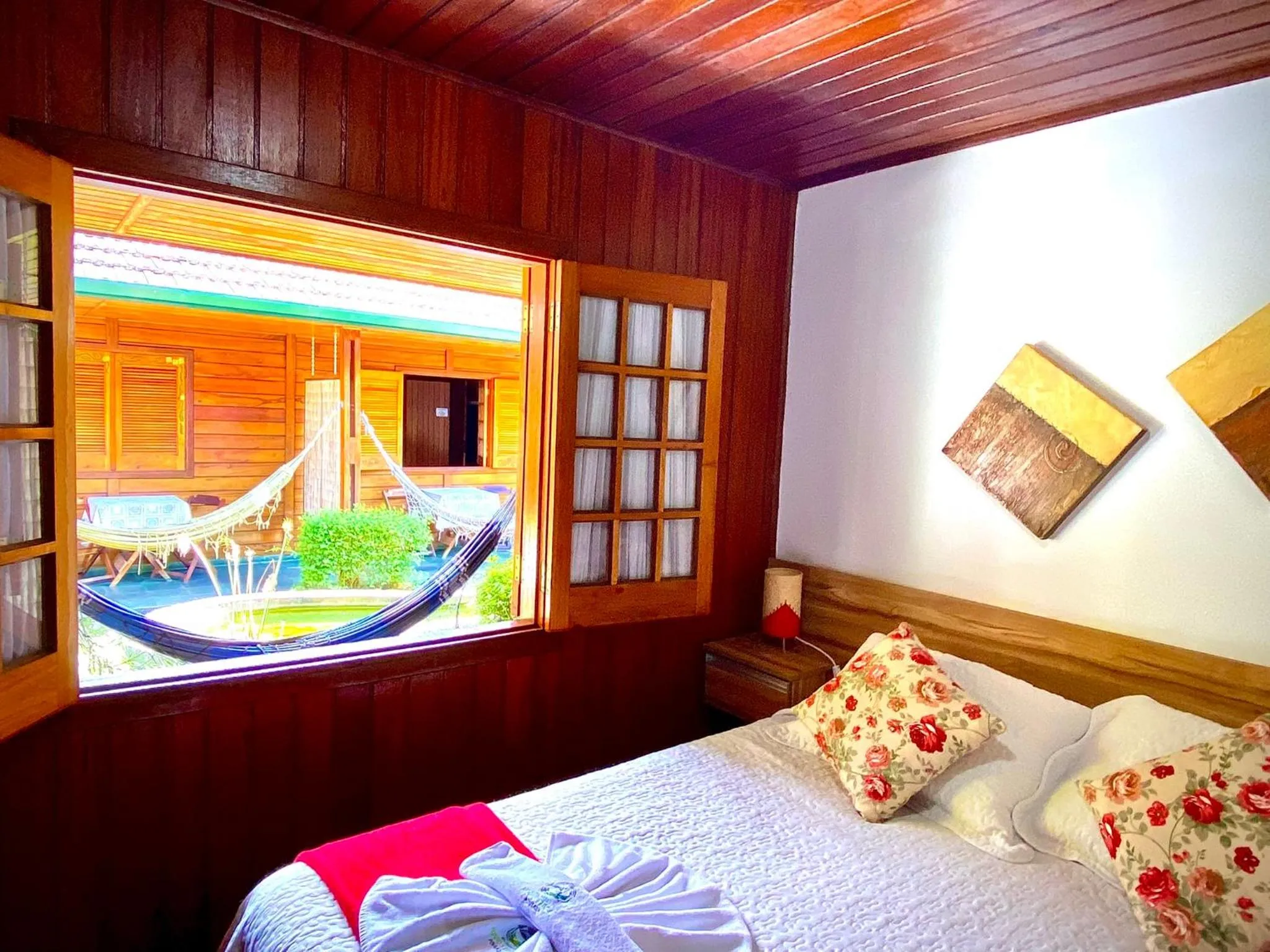 Bed in Pousada Recanto Ninho Verde Chalés