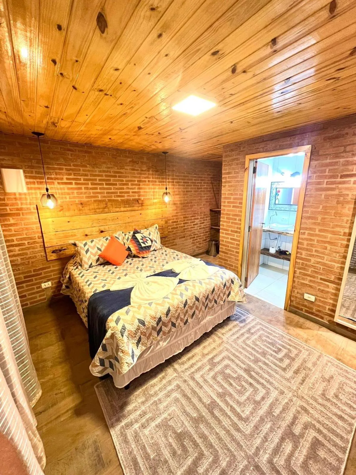 Bed in Pousada Recanto Ninho Verde Chalés