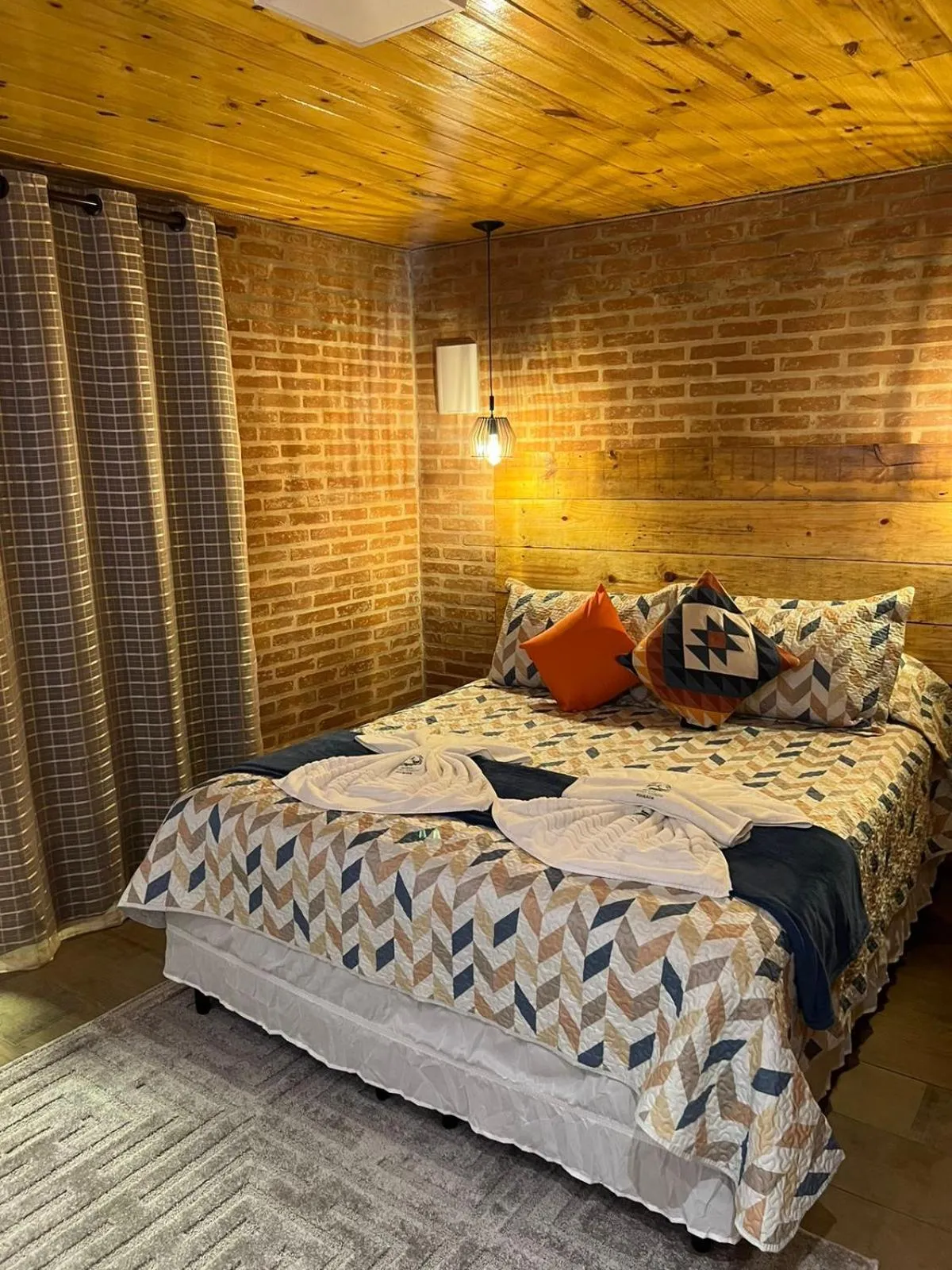 Bed in Pousada Recanto Ninho Verde Chalés