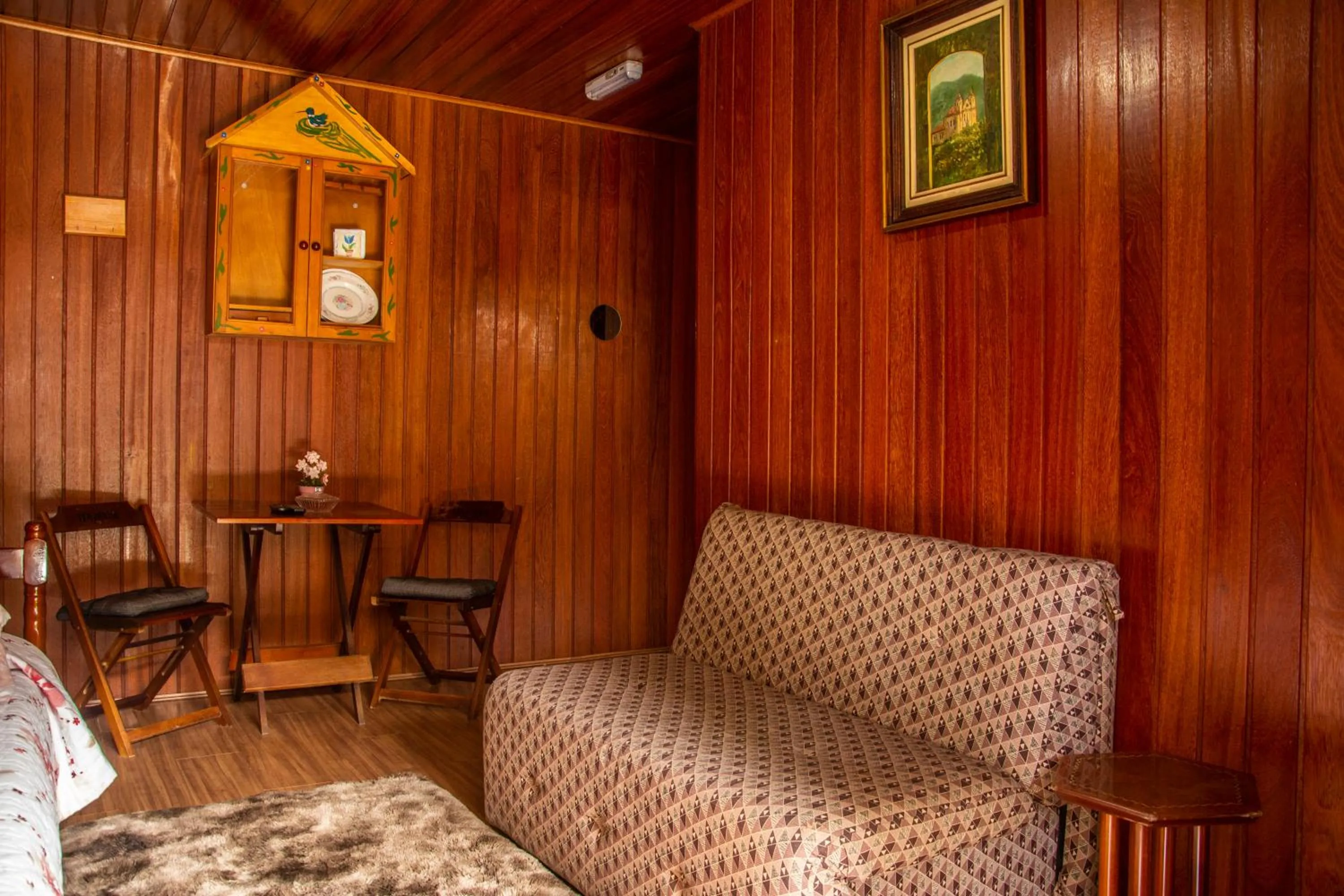 Living room in Pousada Recanto Ninho Verde Chalés