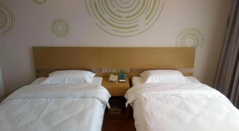 Bed in GreenTree Inn Qingdao Jiaozhou Jiaoping Road Express Hotel